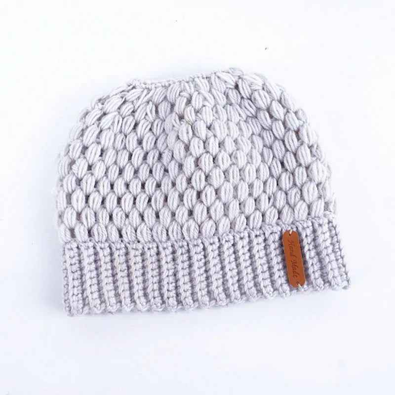 Gorros de cola de caballo de punto de invierno para mujer