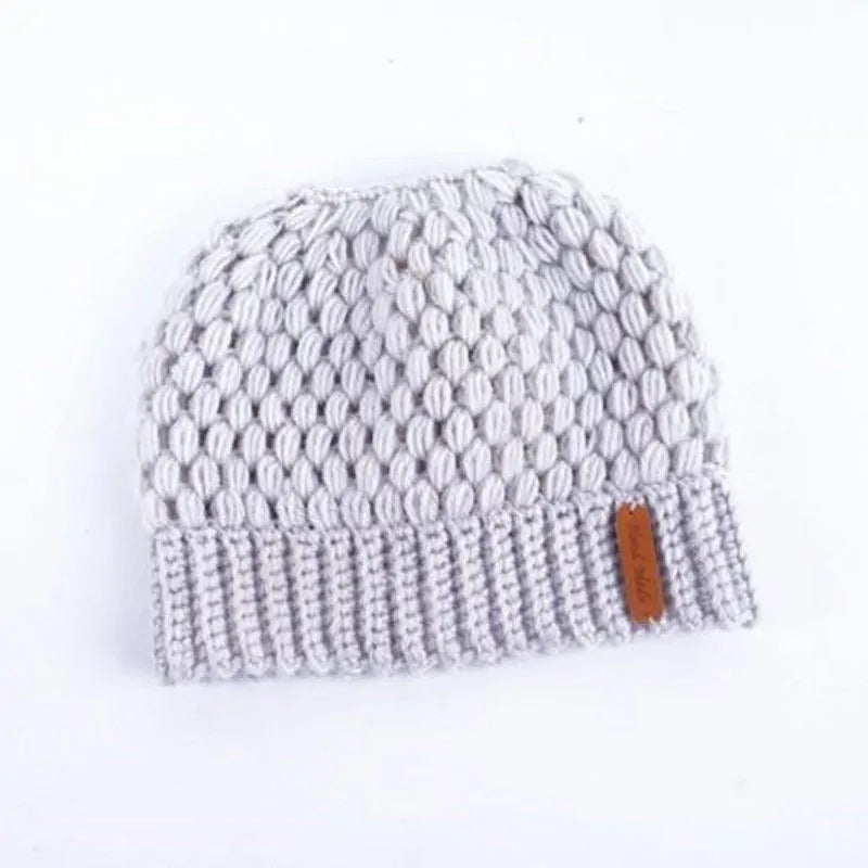 Gorros de cola de caballo de punto de invierno para mujer